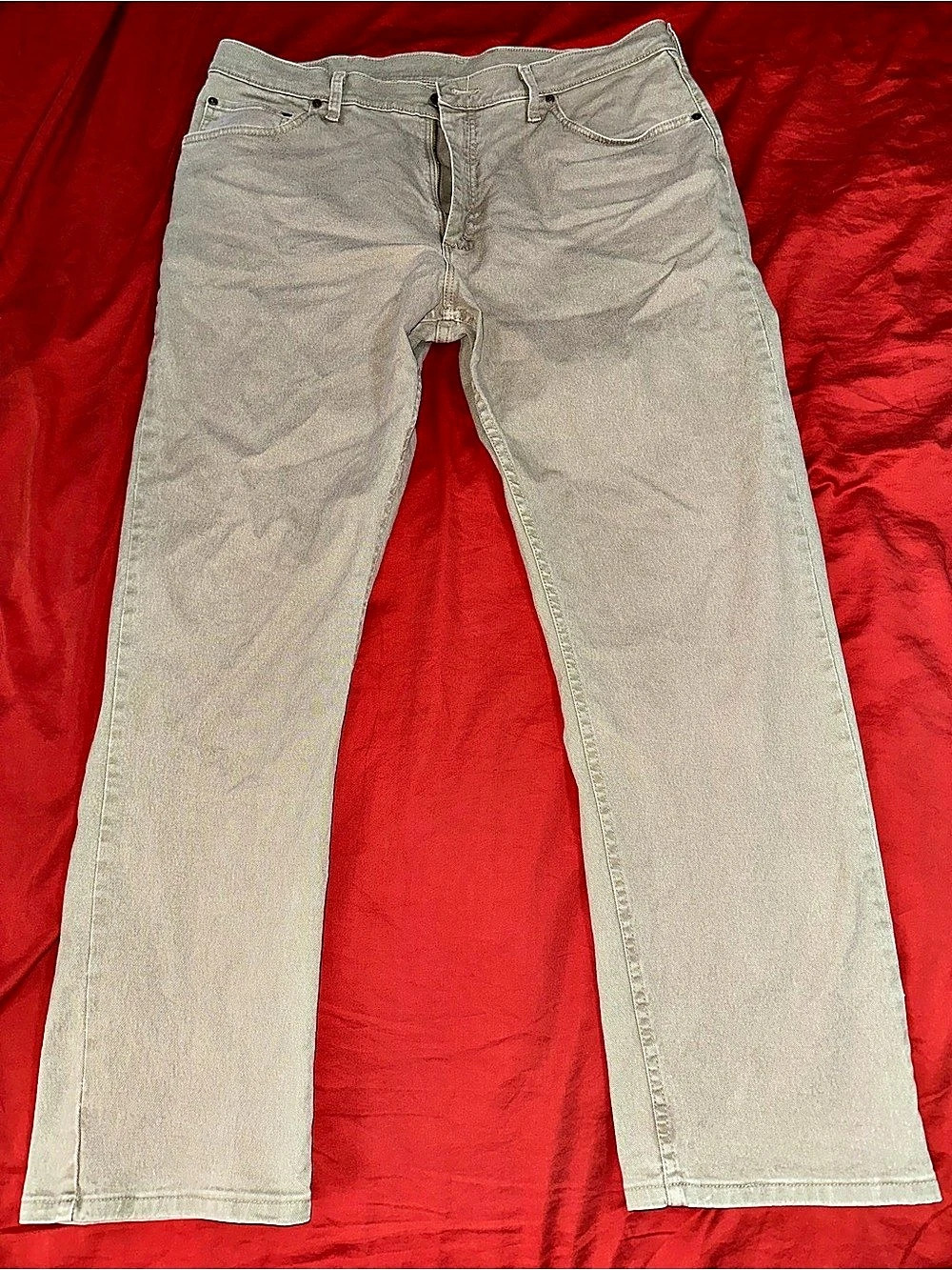 Wrangler men’s relaxed-fit khaki pants, size 38x32.